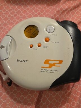 VINTAGE Sony White and Black Portable CD PlayerWalkman with Orange Accents